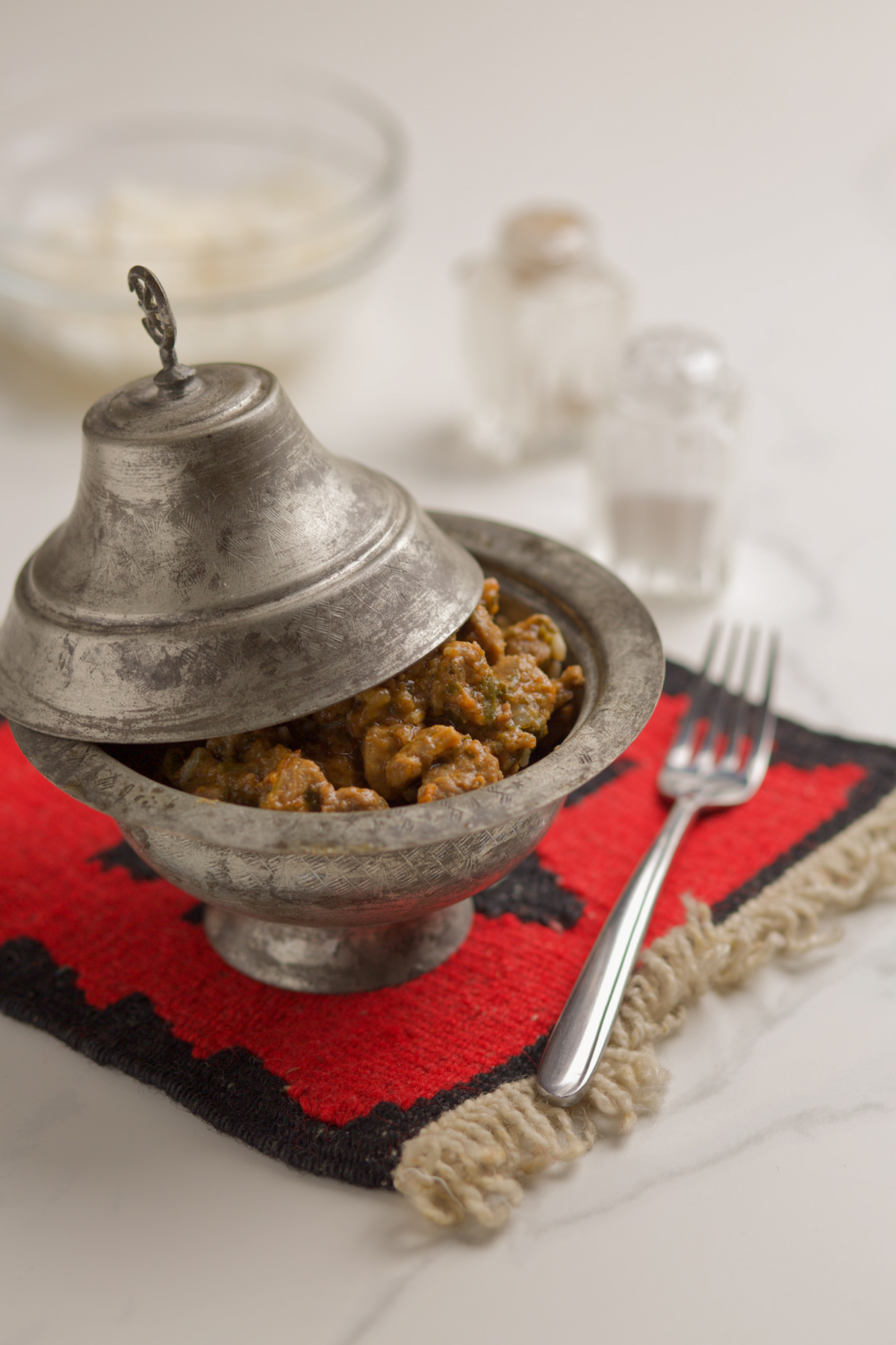 Meat dish served in a traditional bowl sahan. 