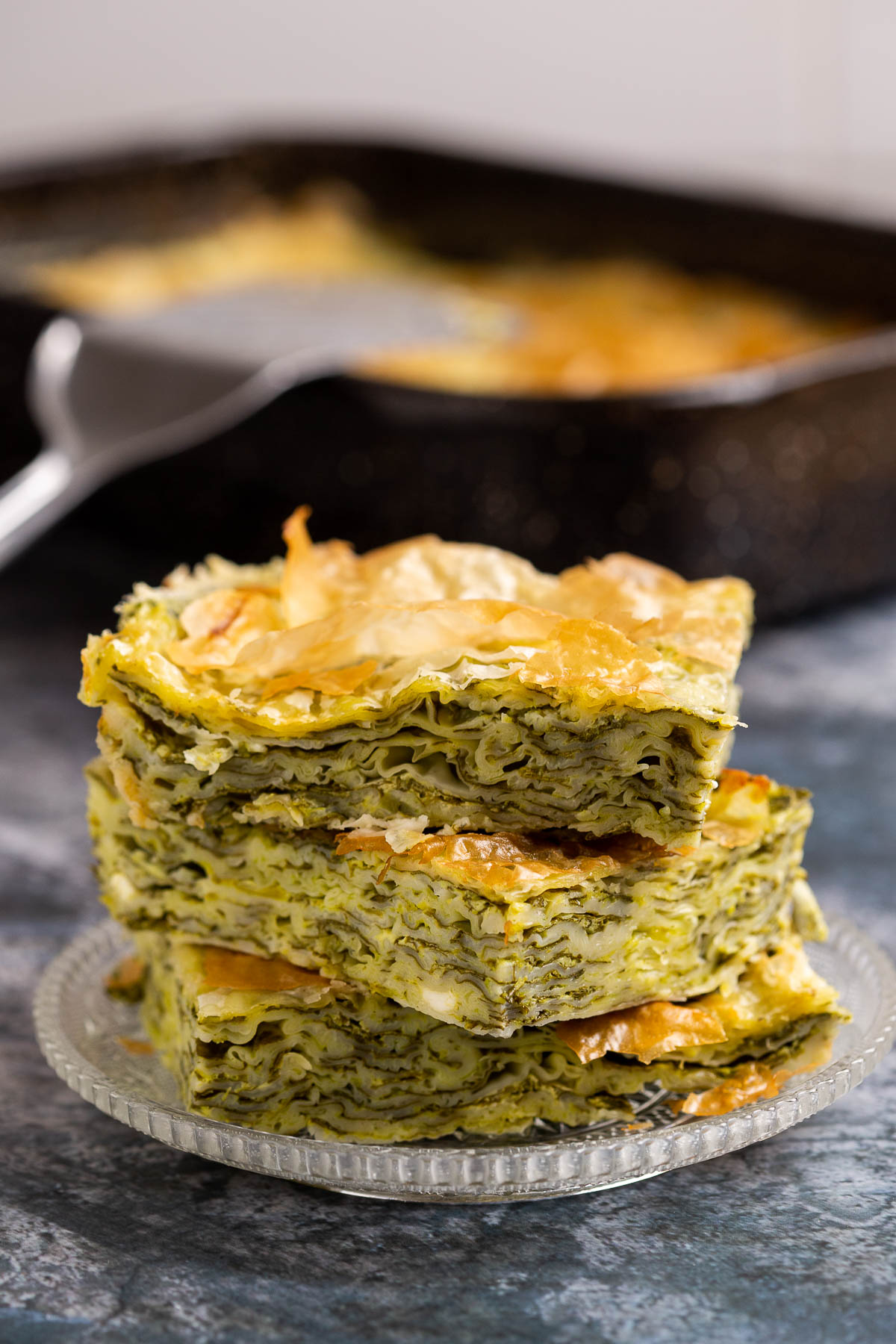 Three pieces of spinach pie.