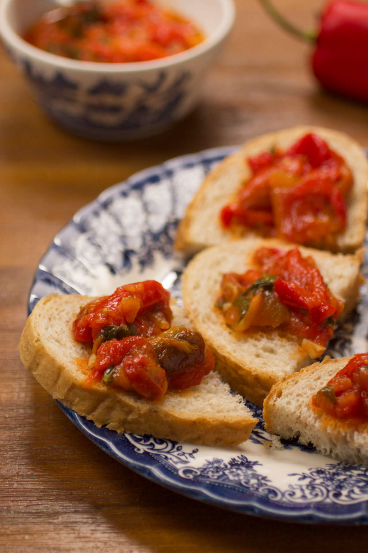 Several sandwich halves on a plate. 