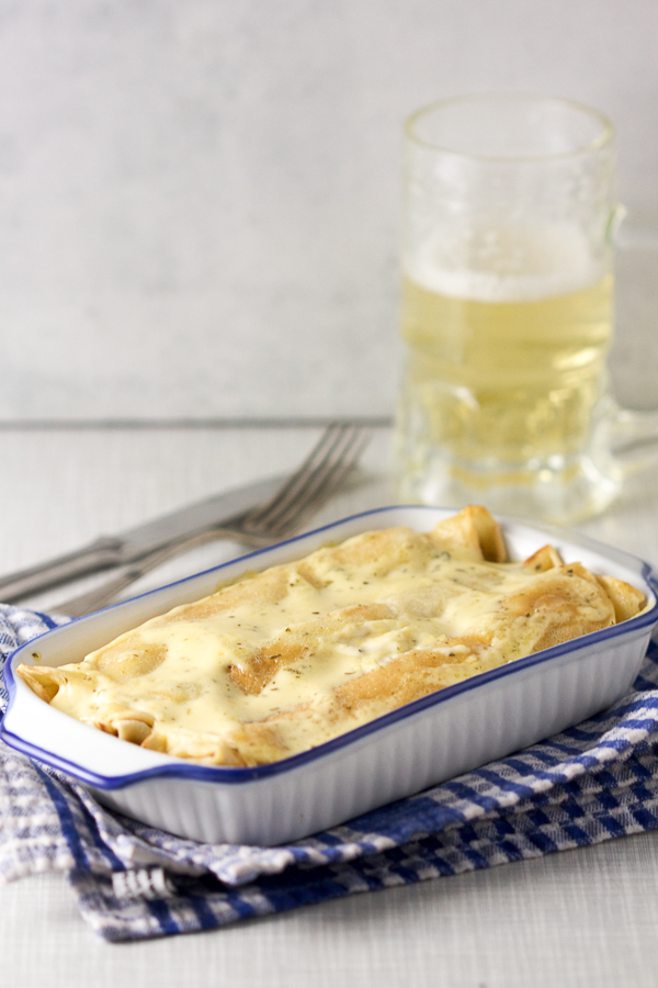 Baked Crepes with Mushrooms and Tartar Sauce. Crepes have graduated to dinner! Lacy crepes filled with simmered mushrooms, topped with tartar sauce and baked. 