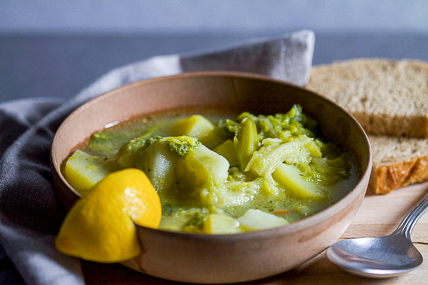 Garlic, potatoes and kale are all that's necessary to make this invigorating stew. What we have here is a vegetarian dish to keep you full and energized until the next day's breakfast. (Lemon is optional, although recommended.)