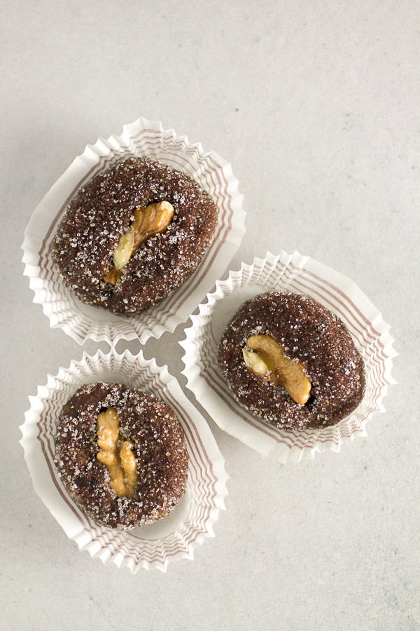 Apricot raisin walnut cookie boats: a simple cookie with a complicated name. Apricots and raisins ground in a meat grinder, combined with sugar and chocolate, then topped off with a walnut.