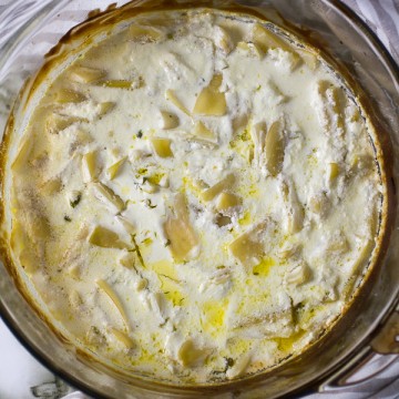 Let's venture to the side not prepared often enough - velvety, baked Romano beans. Lush, wide and flat beans quartered and softened, then baked with heavy cream-plus-garlic topping.  Striking. 