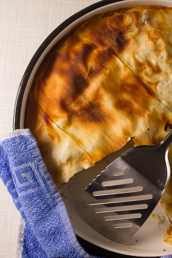 Ground beef phyllo pie. Ground beef (or veal) layered in phyllo sheets softened with butter, then baked until golden. Much pie. Not much fuss. 