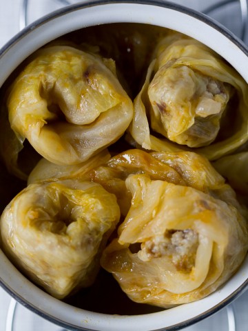 They don't call stuffed cabbage (sarma) the queen of the winter for nothing. Tender meat mixed with delicate rice, enriched with few simple seasonings then lovingly wrapped in fermented cabbage leaves. Cooked on low heat for a few hours until aromas and flavors embrace is nothing short of sensational. 