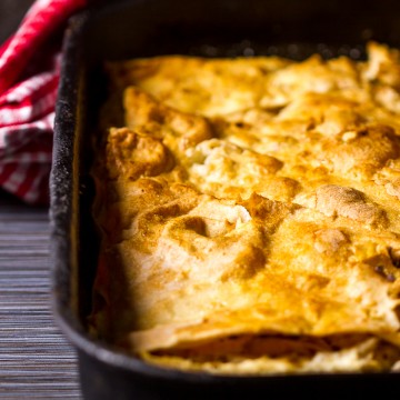 The most tender and soft chicken pie infused with homemade chicken broth. First the chicken is brought to boil until it gives its all to the broth, and then shredded. Shredded pieces are used in between crunchy phyllo (or tortillas even), infused with broth and baked.