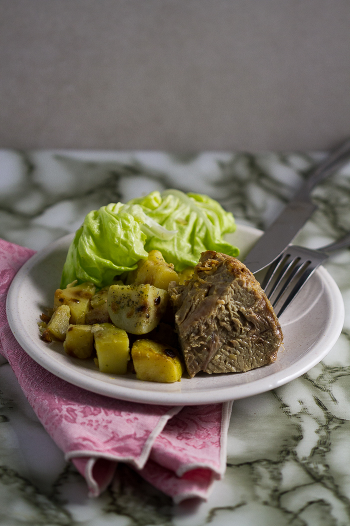 Classic veal (under) shoulder roast with onion potatoes. What you get is succulent, falling-off-the-bone meat, as perfect pairing with potatoes that were first boiled then simmered over onion for a seamless soft+crunch combo.  