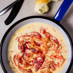 Flawlessly roasted, tender red bull's horn peppers in heavy cream-plus-cheese white sauce... This peppers sauce recipe is achieved by first roasting peppers (you can use bell peppers instead of Italian bull horn peppers) to a soft perfection, and then simmered in heavy cream, garlic and cheese. How perfect is this side dish?