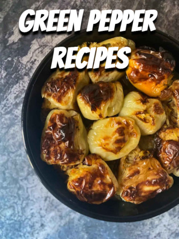 A pan of baked green peppers in a round, black pan overhead.