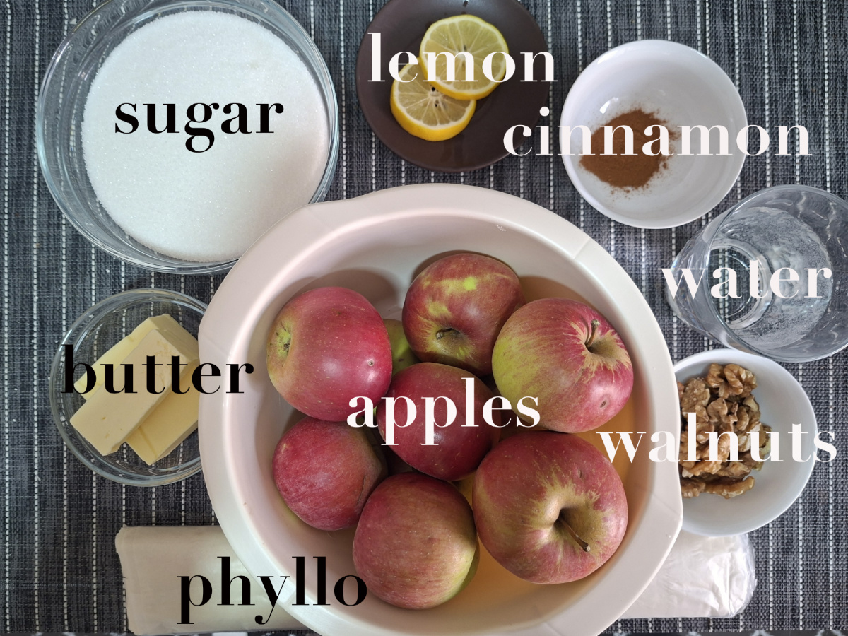 Apple pie ingredients: apples, sugar, lemon, cinnamon, butter, phyllo, walnuts, water.
